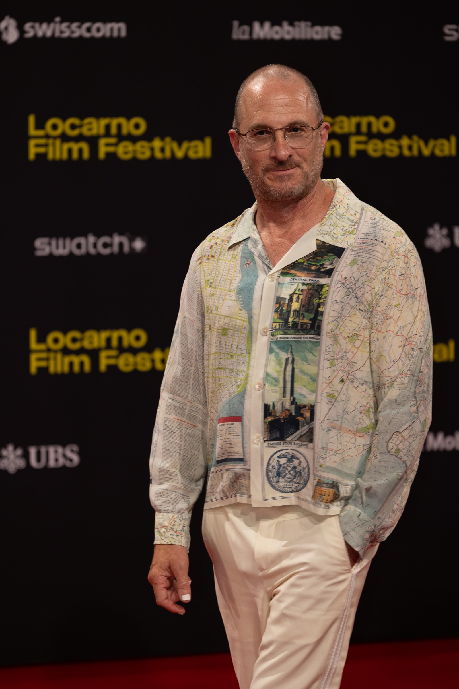 Darren Aronofsky photographed at the Locarno Film Festival on 14 August 2026, not at the upcoming Camerimage festival.
