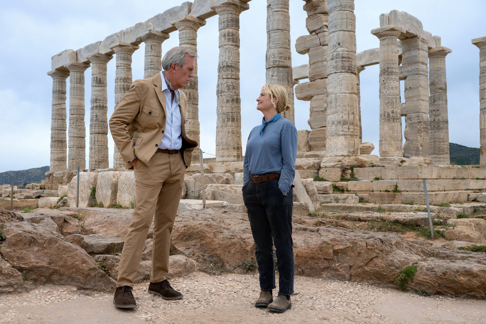 Hugh Laurie and Amy Poehler face one another at Greek ruins in DIG.
