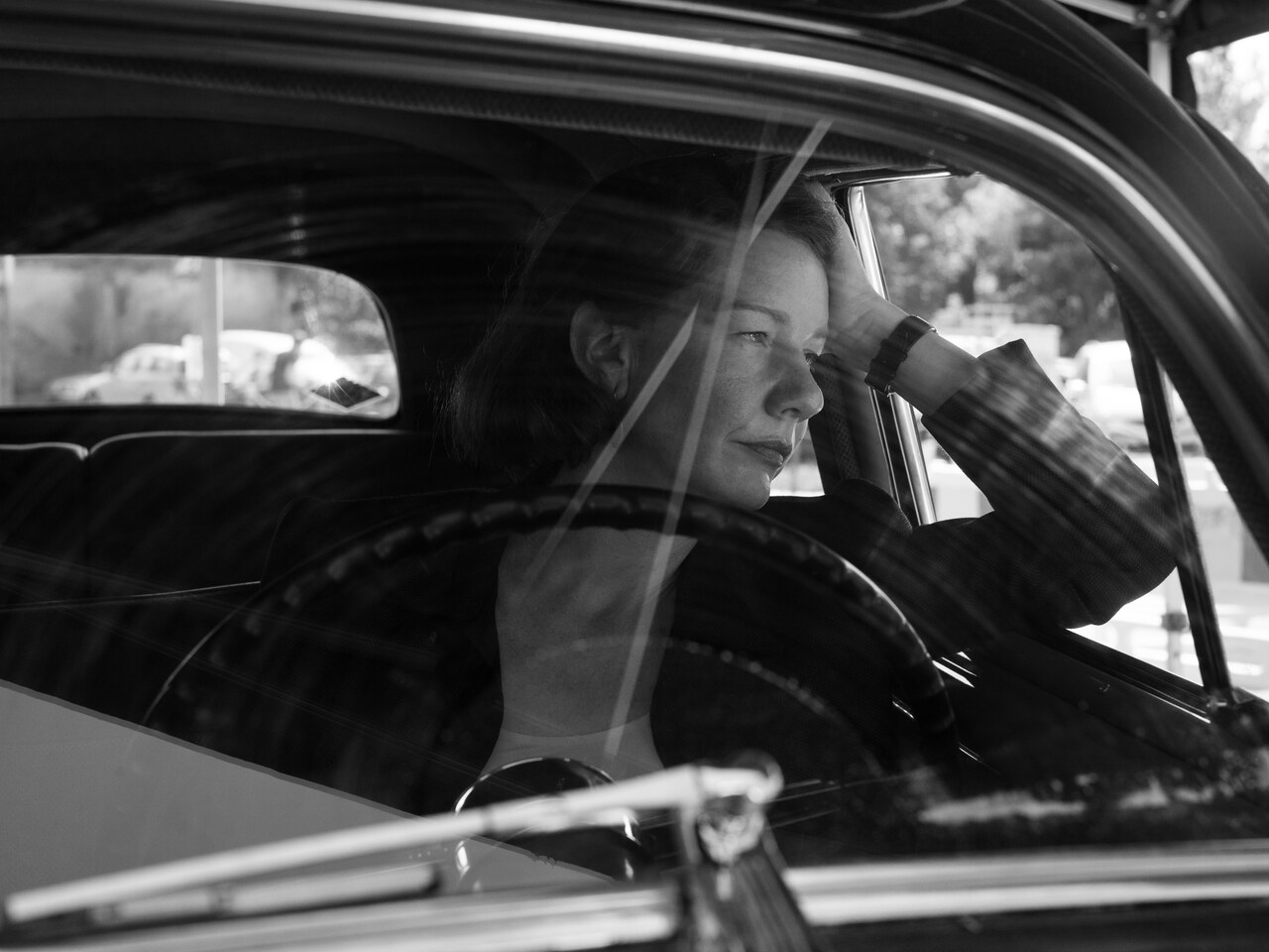 Sandra Hüller as Erika Mann in Fatherland, seen through a car window.